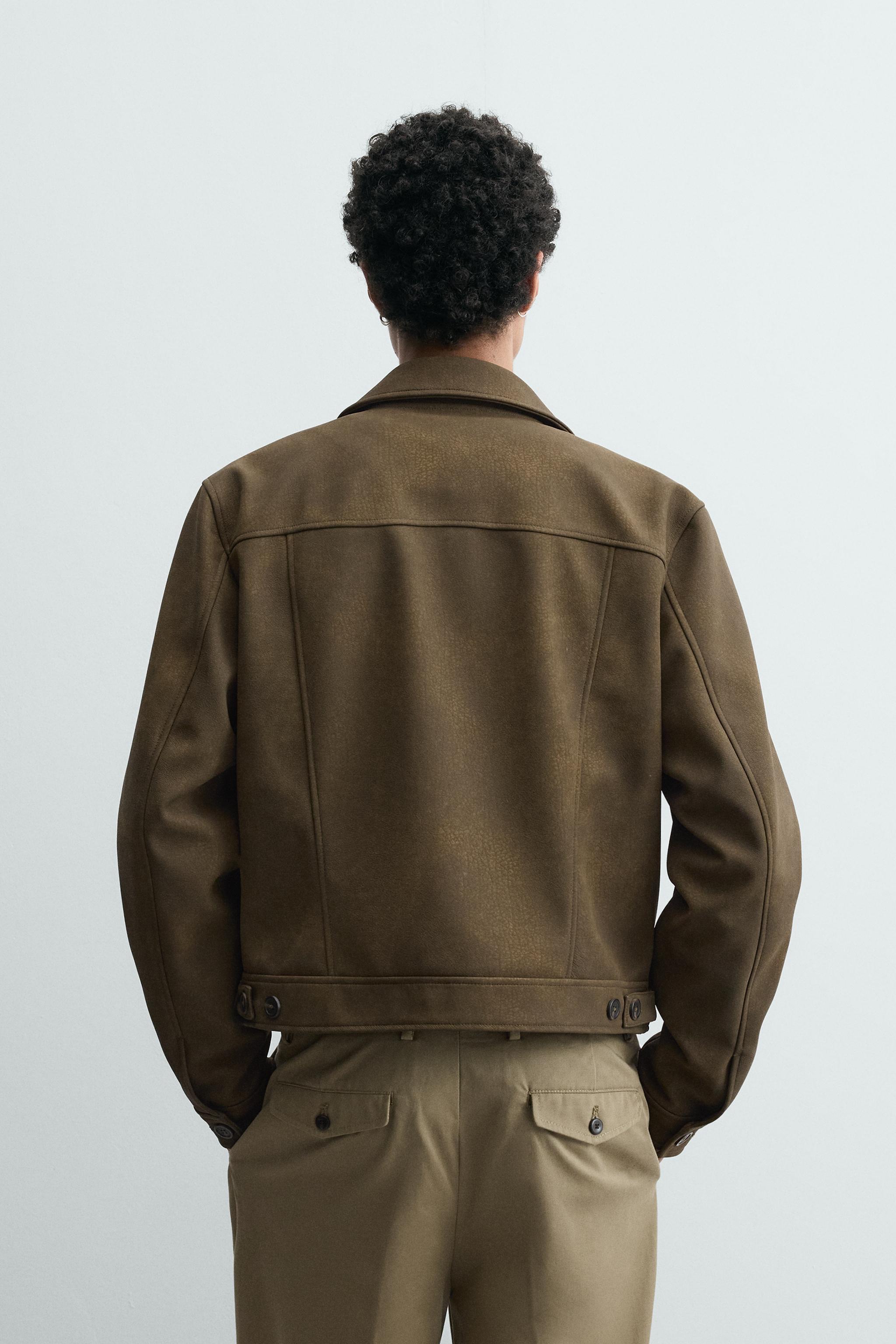 BLOUSON COURT EN MATIÈRE SYNTHÉTIQUE